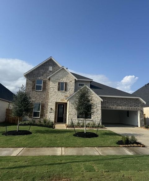 Photo of 26202 Snowpeak Avenue, Katy, TX 77493 (MLS # 17499309)