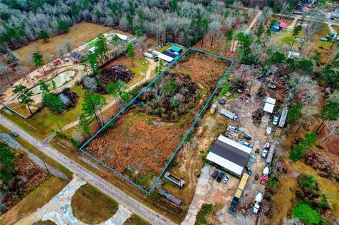 Photo of 1695 County Road 3434 N, Cleveland, TX 77327 (MLS # 25454422)