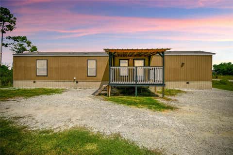 Photo of 320 Road 5821, Cleveland, TX 77327 (MLS # 92907652)