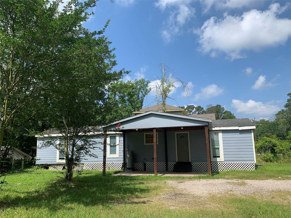 Photo of 26846 Coach Light Lane, New Caney, TX 77357 (MLS # 44579107)