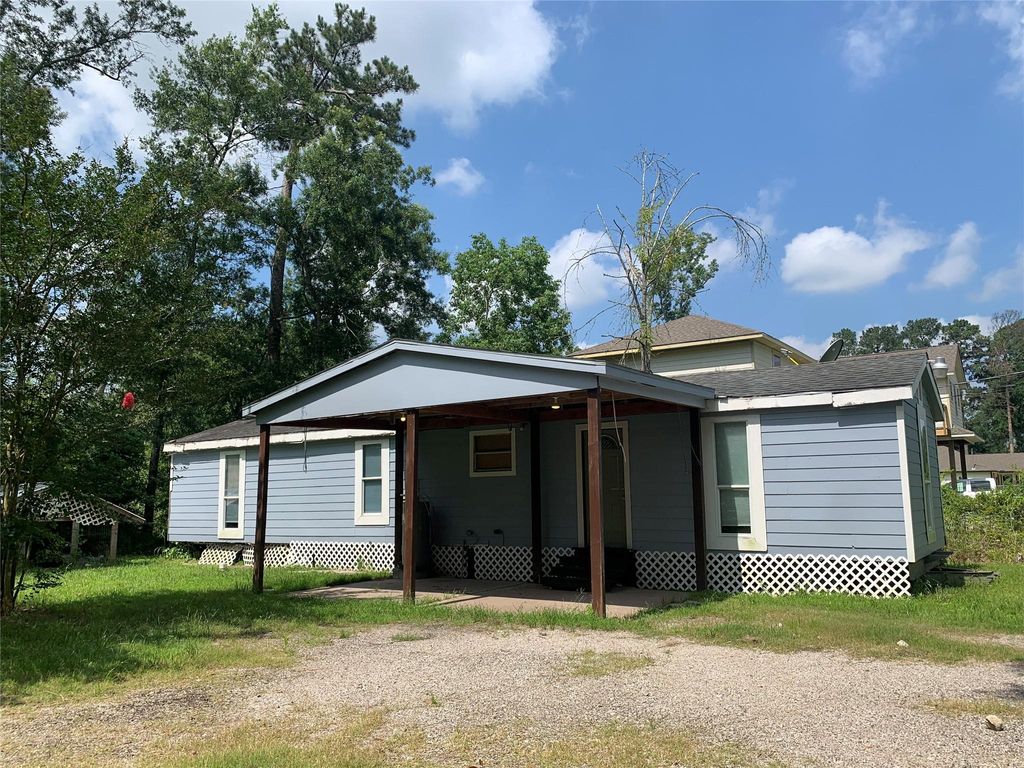 Photo of 26846 Coach Light Lane, New Caney, TX 77357 (MLS # 44579107)