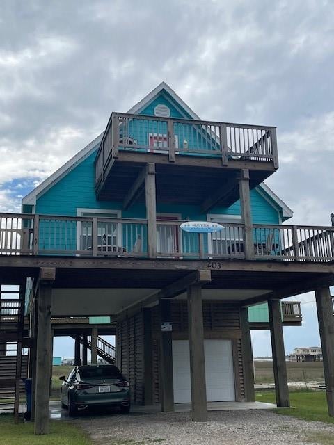 Photo of 203 Sea Oats Drive, Surfside Beach, TX 77541 (MLS # 92762331)