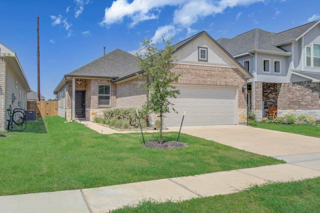 Photo of 4238 Wind Swell Lane, Houston, TX 77053 (MLS # 98830739)