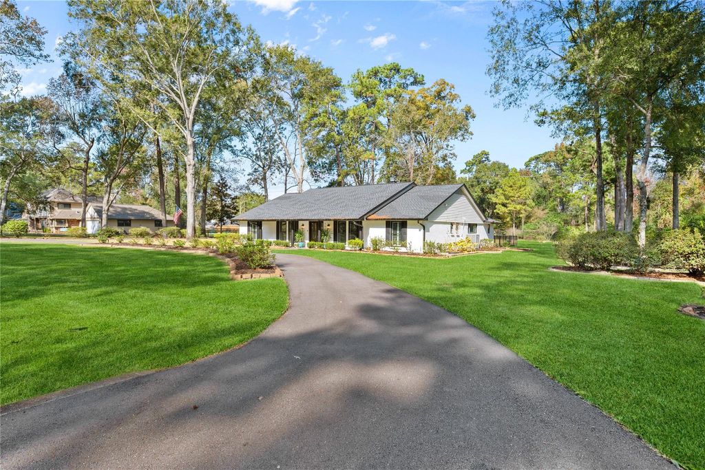 Photo of 1611 Palomino Lane, Kingwood, TX 77339 (MLS # 28712245)