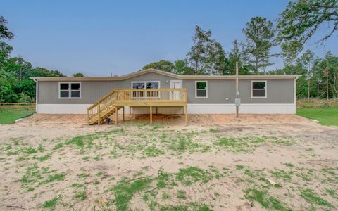 Photo of 14368 Forest Circle, Montgomery, TX 77356 (MLS # 62680375)