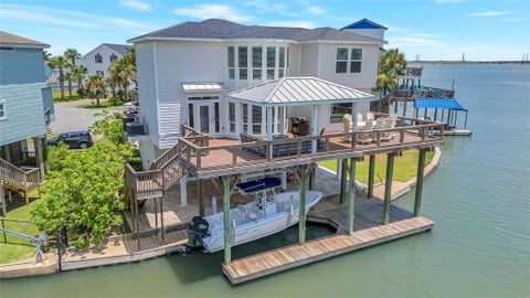Photo of 1303 Outrigger, Tiki Island, TX 77554 (MLS # 62459118)