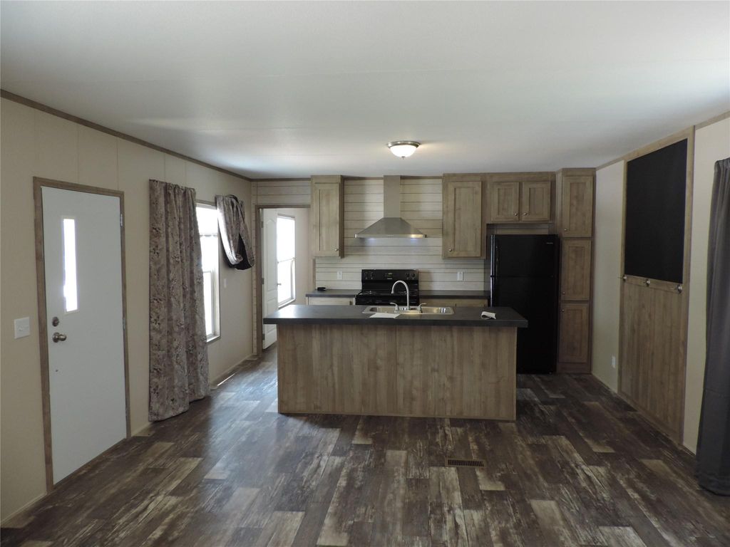 Photo of 1668 Fm-2518 #77, Cleveland, TX 77327 (MLS # 32852437)