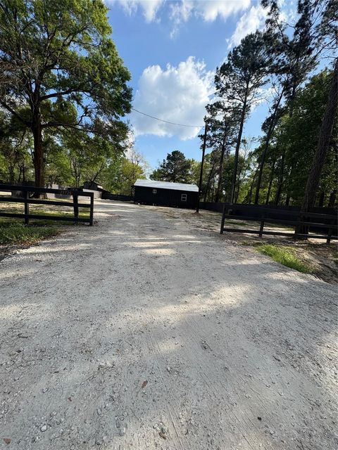 Photo of 23732 Panky Ln Ln, New Caney, TX 77357 (MLS # 49963926)