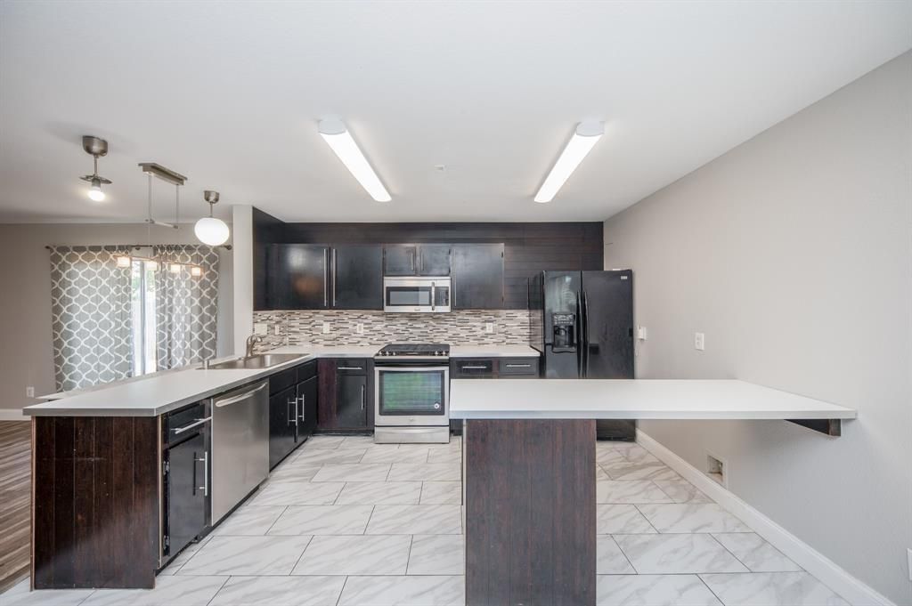 Photo of 7726 Galleon Field Lane, Cypress, TX 77433 (MLS # 21147649)