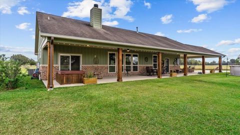 Photo of 645 County Road 2291, Cleveland, TX 77327 (MLS # 92898839)