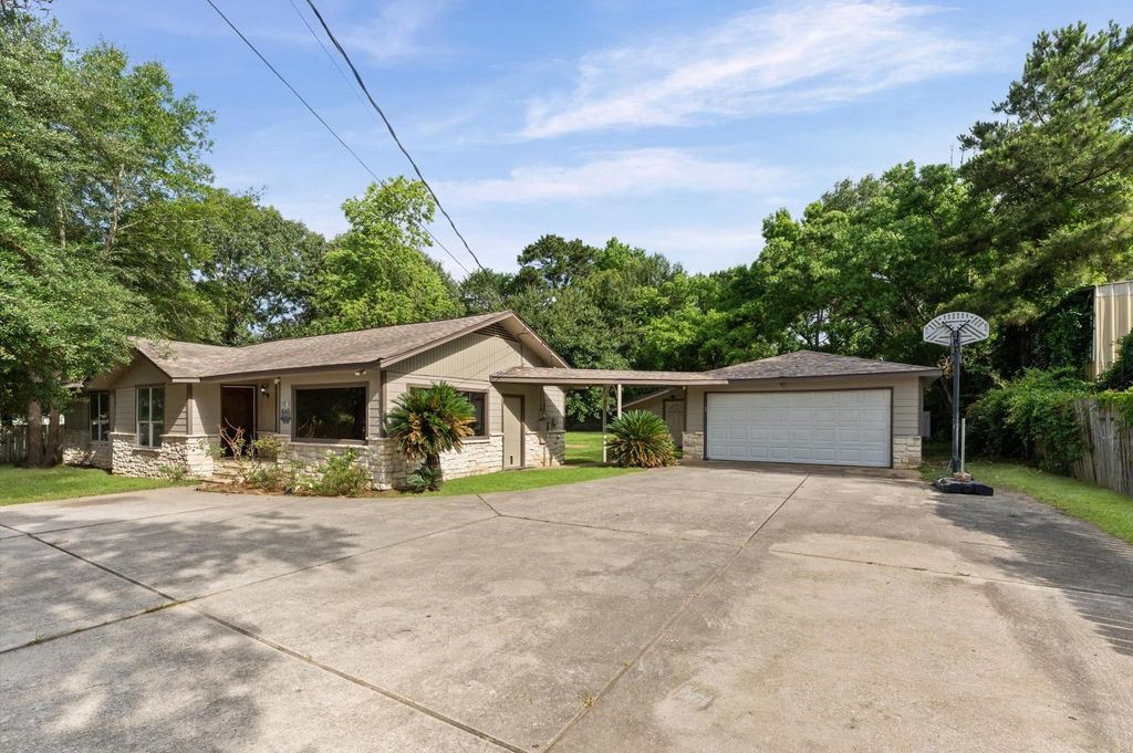 Photo of 1505 Gladiola Avenue, Conroe, TX 77301 (MLS # 98092666)