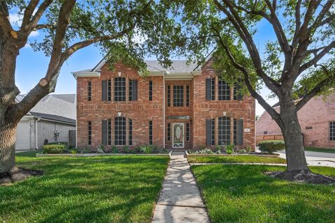 Photo of 218 Magnolia Grove Lane, Houston, TX 77049 (MLS # 33576423) Photo of 218 Magnolia Grove Lane, Houston, TX 77049 (MLS # 33576423)