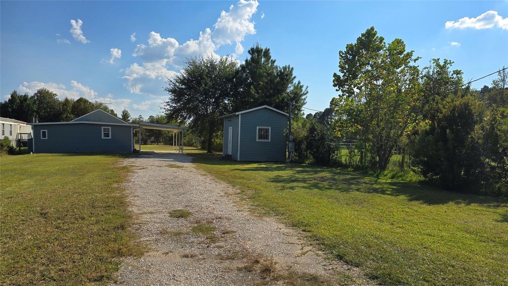 Photo of 2717 County Road 3479b, Cleveland, TX 77327 (MLS # 62498171)