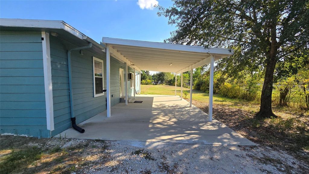 Photo of 2717 County Road 3479b, Cleveland, TX 77327 (MLS # 62498171)