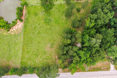 Photo of 4931 Hwy 150 W, New Waverly, TX 77358 (MLS # 78371780)