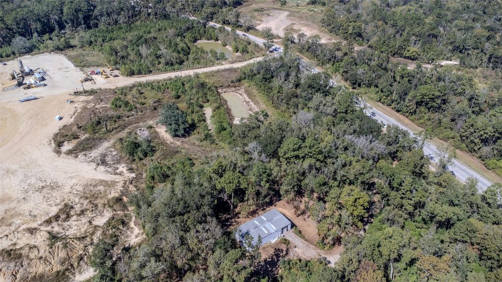 Photo of 0 Fm 1485, New Caney, TX 77357 (MLS # 50633170)