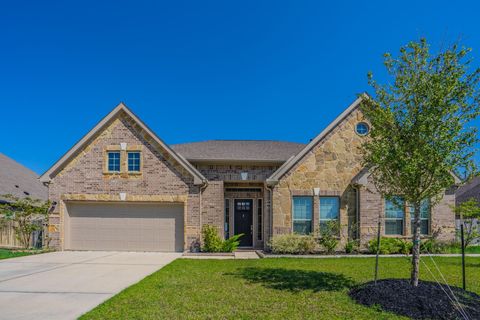 Photo of 11903 Oakwood Dr DR, Mont Belvieu, TX 77535 (MLS # 76018463)