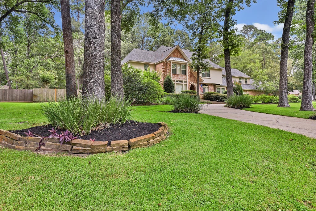 Photo of 2515 Kings Forest Drive, Kingwood, TX 77339 (MLS # 96473347)