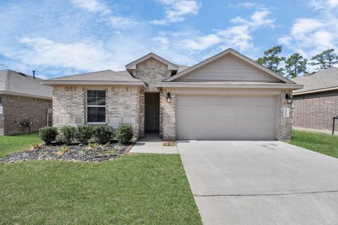 Photo of 9826 Laurel Lake Drive, Conroe, TX 77384 (MLS # 70343872)