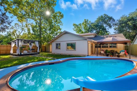 Photo of 6938 Mobud Drive, Houston, TX 77074 (MLS # 54086941)