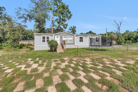 Photo of 595 County Road 2218, Cleveland, TX 77327 (MLS # 11473414)