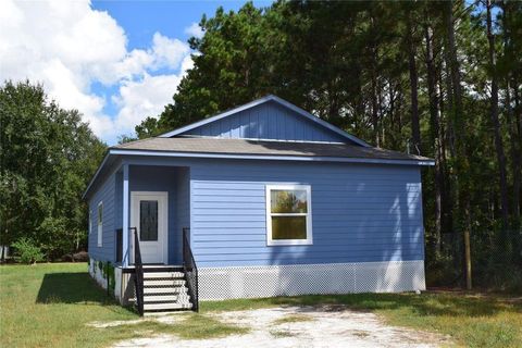 Photo of 740 County Road 5015, Cleveland, TX 77327 (MLS # 9499749)