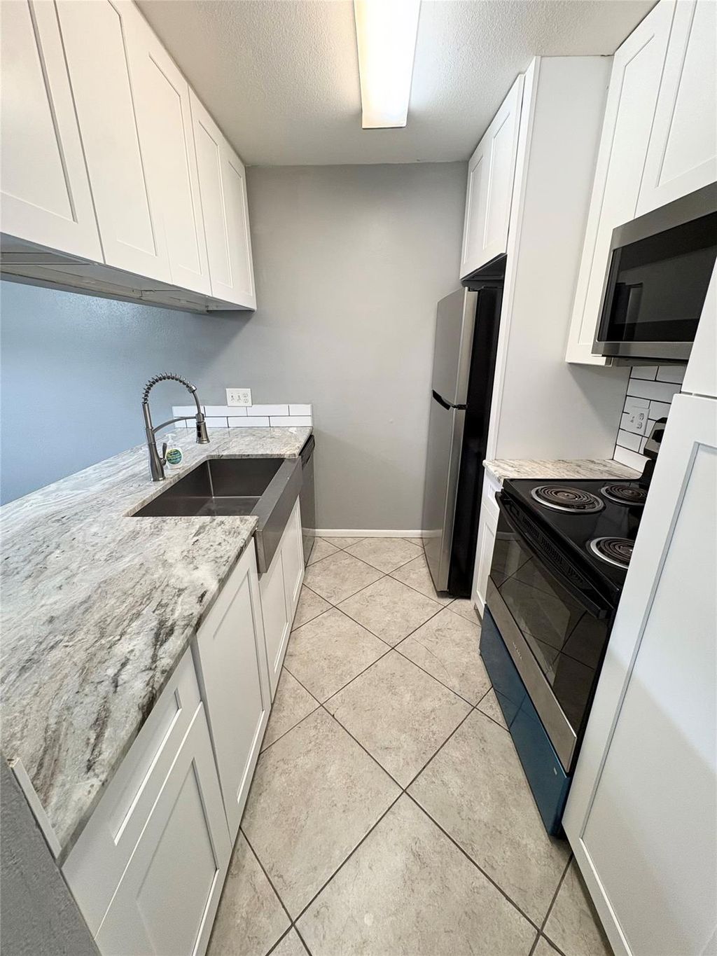 Photo of 3015 Walnut Bend Lane #13, Houston, TX 77042 (MLS # 21924893)