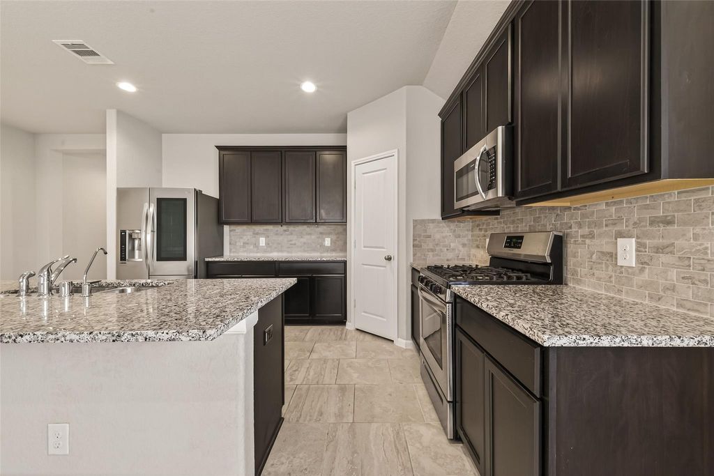 Photo of 12623 City Village Lane, Houston, TX 77047 (MLS # 66118839)