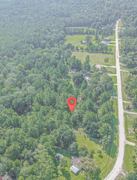 Photo of 0 Rolling Wood, Livingston, TX 77351 (MLS # 93830571)