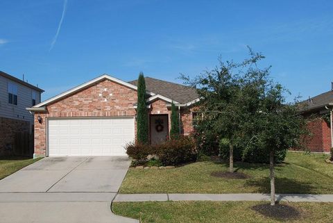 Photo of 4717 Woodspring Glen Lane, Houston, TX 77345 (MLS # 32821163)