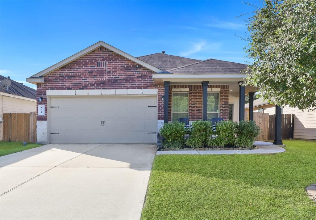 Photo of 9466 E Woodmark, Conroe, TX 77304 (MLS # 97584180)