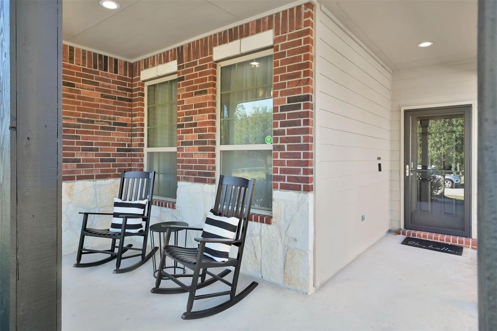 Photo of 9466 E Woodmark, Conroe, TX 77304 (MLS # 97584180)