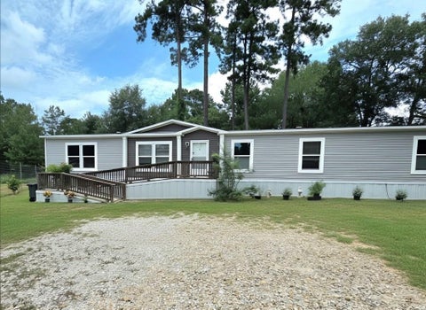 Photo of 7715 Walnut Tree Lane, Plantersville, TX 77363 (MLS # 48347021)