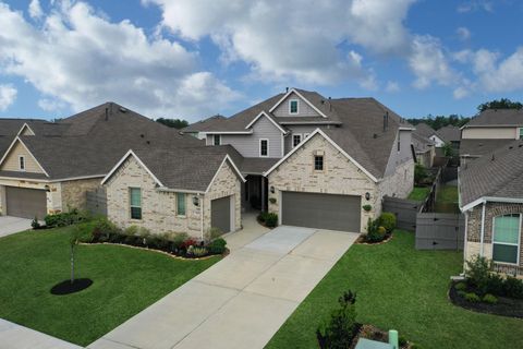 Photo of 18323 Tiger Flowers Drive, Conroe, TX 77302 (MLS # 64850007)