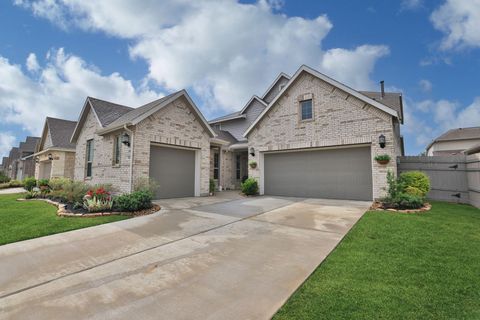 Photo of 18323 Tiger Flowers Drive, Conroe, TX 77302 (MLS # 64850007)