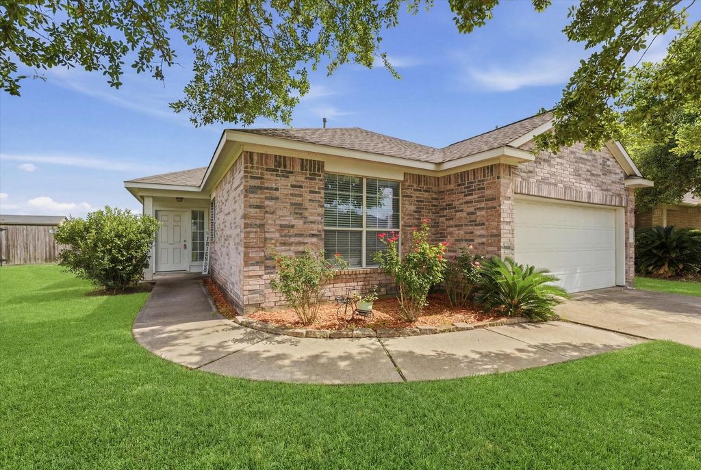 Photo of 10707 Mocker Nut Street, Baytown, TX 77523 (MLS # 27985330)