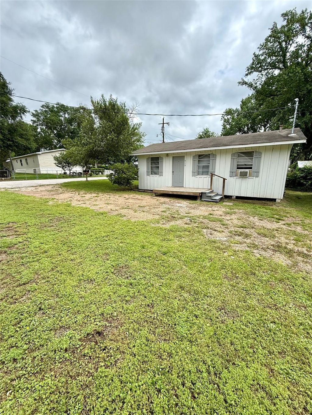 Photo of 519 Mcguire Ln Ln, Huntsville, TX 77340 (MLS # 80880244)