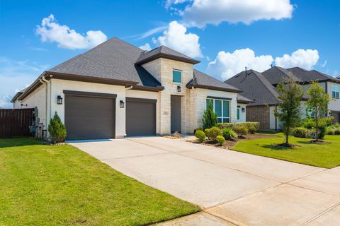 Photo of 25018 Pavonia Lake Lane, Tomball, TX 77375 (MLS # 83362564)