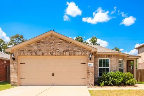 Photo of 12066 Quartersawn Lane, Pinehurst, TX 77362 (MLS # 5546096)