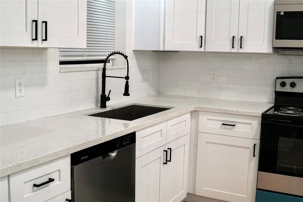 Photo of 9705 Garcroft Street St #A, Houston, TX 77029 (MLS # 50738226)