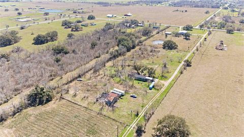 Photo of 1224 County Road 32, Angleton, TX 77515 (MLS # 20074653)