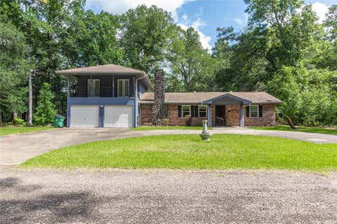 Photo of 302 Oak Lane, Village Mills, TX 77663 (MLS # 25892820)