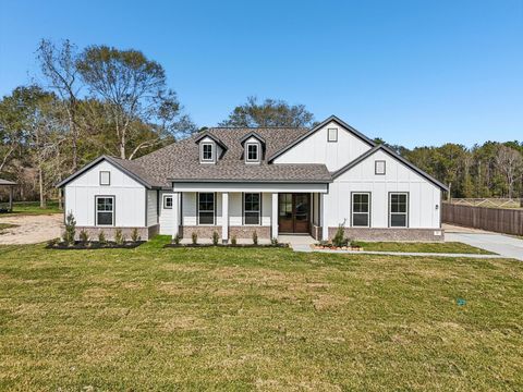 Photo of 700 Barton Place Drive, Tarkington, TX 77327 (MLS # 33412934)