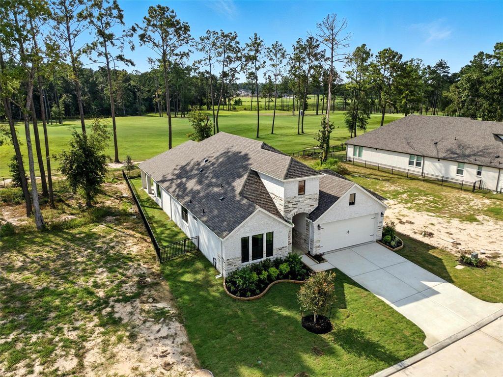 Photo of 21853 Victory Green Way Way, Porter, TX 77365 (MLS # 50233416)