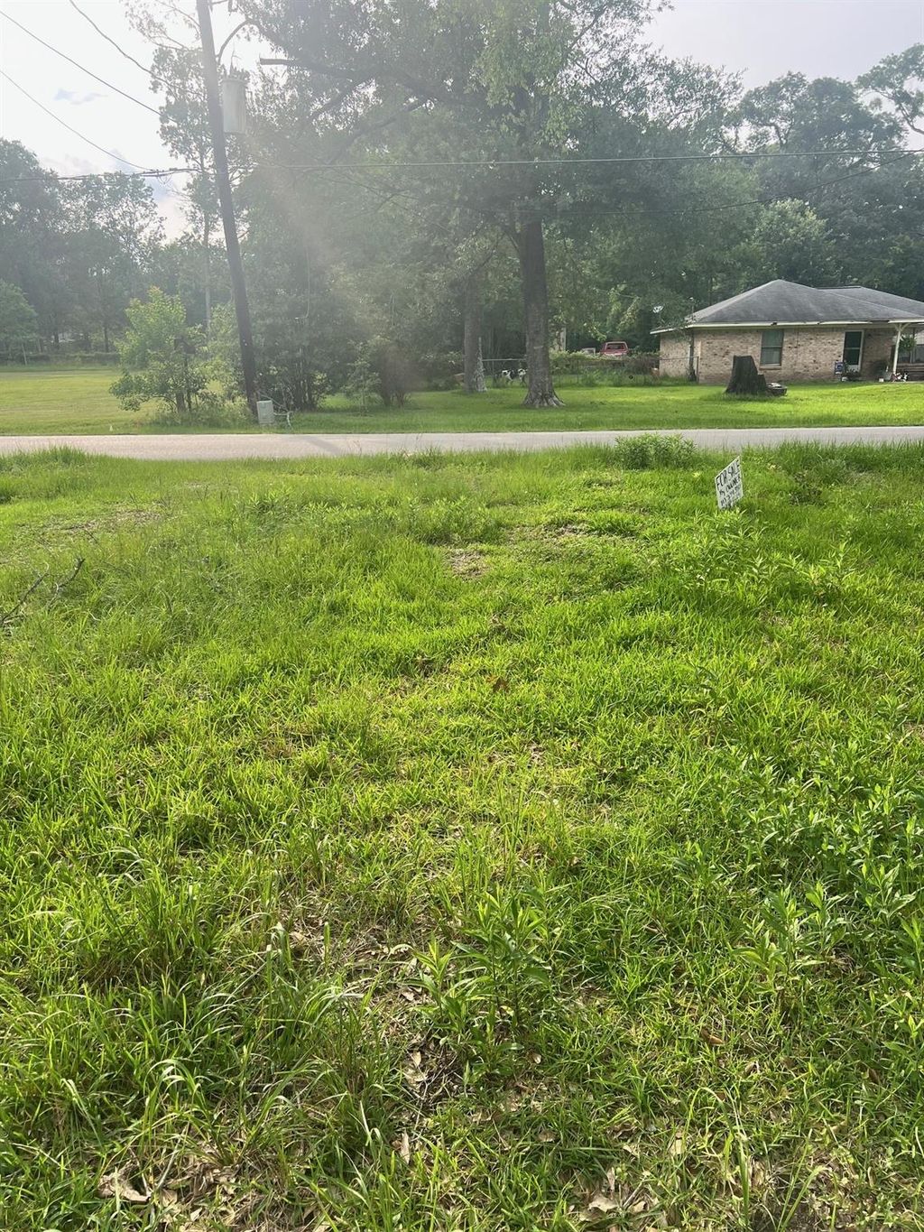 Photo of 48 Magnolia Road, Woodbranch, TX 77357 (MLS # 17021591)