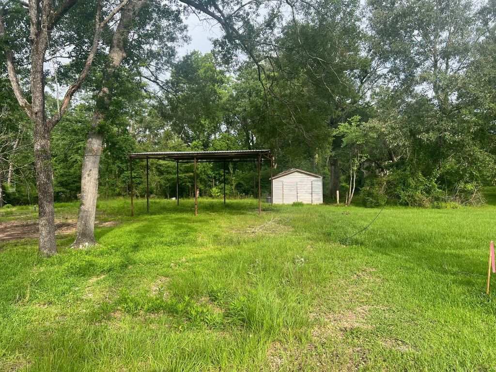 Photo of 48 Magnolia Road, Woodbranch, TX 77357 (MLS # 17021591)