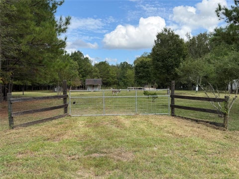 Photo of 410 County Road 2147, Cleveland, TX 77327 (MLS # 44279852)