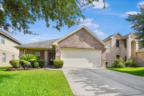 Photo of 10351 Whisper Bluff Drive, Humble, TX 77396 (MLS # 27365291)