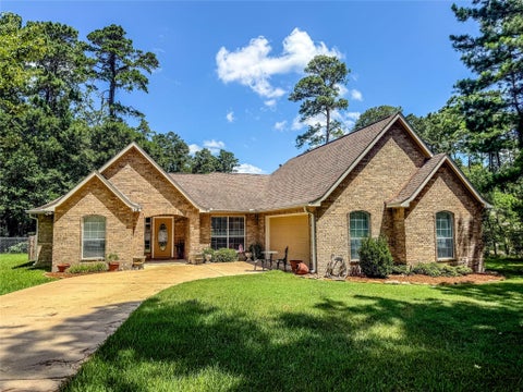 Photo of 1112 Tiel Way, Huntsville, TX 77340 (MLS # 8005443)