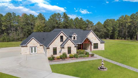 Photo of 11173 County Road 302, Plantersville, TX 77363 (MLS # 87094981)